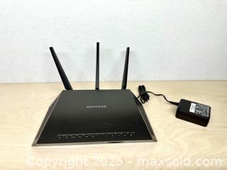 MaxSold Auction: Netgear Nighthawk Smart Wi-Fi Router - Toronto (Ontario, Canada) SELLER MANAGED Downsizing Online Auction - Nassau Street