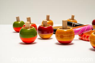 MaxSold Auction: Painted Wood Spinning Top Toys and Bracelets - Toronto (Ontario, Canada) SELLER MANAGED Downsizing Online Auction - Nassau Street
