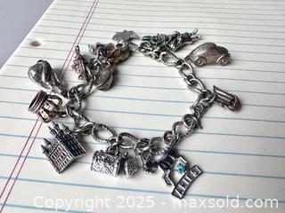 MaxSold Auction: Sterling Silver Charms Bracelet - Toronto (Ontario, Canada) SELLER MANAGED Downsizing Online Auction - Nassau Street
