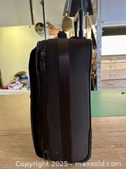 MaxSold Auction: TUMI 2 Wheeled Carry-on Suitcase - Toronto (Ontario, Canada) SELLER MANAGED Downsizing Online Auction - Nassau Street