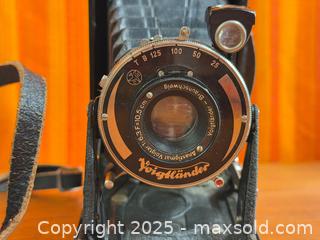 MaxSold Auction: Polaroid &#39;100&#39; Land Camera + Voigtländer Bessa - Hamilton (Ontario, Canada) SELLER MANAGED Estate Sale Online Auction - Gertrude Street