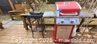 MaxSold Auction: Nexgrill Red Barbecque and small utility table - North Bay (Ontario, Canada) SELLER MANAGED Downsizing Online Auction - Campbell Avenue