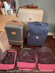 MaxSold Auction: Lot of Luggage and Packing Cubes — 3 Suitcases &#38; 3 Cubes - St. Petersburg (Florida, USA) SELLER MANAGED Estate Sale Online Auction - Sunshine Skyway Lane (CONDO)
