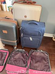 MaxSold Auction: Lot of Luggage and Packing Cubes — 3 Suitcases &#38; 3 Cubes - St. Petersburg (Florida, USA) SELLER MANAGED Estate Sale Online Auction - Sunshine Skyway Lane (CONDO)
