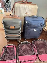 MaxSold Auction: Lot of Luggage and Packing Cubes — 3 Suitcases &#38; 3 Cubes - St. Petersburg (Florida, USA) SELLER MANAGED Estate Sale Online Auction - Sunshine Skyway Lane (CONDO)