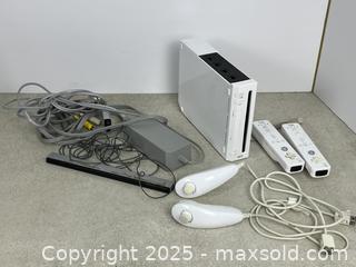 MaxSold Auction: Nintendo Wii Console with Nunchuck Controller and Sensor Bar - Cobourg (Ontario, Canada) SELLER MANAGED Downsizing Online Auction - Burnham Street