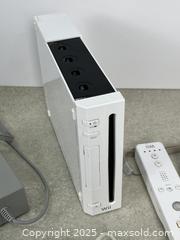 MaxSold Auction: Nintendo Wii Console with Nunchuck Controller and Sensor Bar - Cobourg (Ontario, Canada) SELLER MANAGED Downsizing Online Auction - Burnham Street