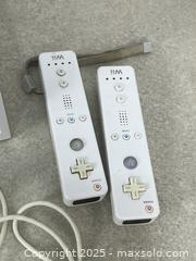 MaxSold Auction: Nintendo Wii Console with Nunchuck Controller and Sensor Bar - Cobourg (Ontario, Canada) SELLER MANAGED Downsizing Online Auction - Burnham Street