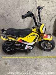 MaxSold Auction: Electric mini bike - North Cowichan (British Columbia, Canada) SELLER MANAGED Downsizing Online Auction - Maple Bay