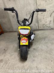 MaxSold Auction: Electric mini bike - North Cowichan (British Columbia, Canada) SELLER MANAGED Downsizing Online Auction - Maple Bay