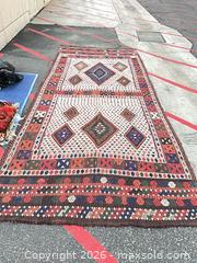 MaxSold Auction: Handwoven Tribal Wool Area Rug 71" x 163" - Commerce (California, USA) PARTNER MANAGED Estate Sale Online Auction - Randolph Street (STORAGE)