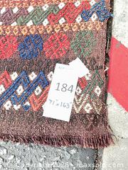 MaxSold Auction: Handwoven Tribal Wool Area Rug 71" x 163" - Commerce (California, USA) PARTNER MANAGED Estate Sale Online Auction - Randolph Street (STORAGE)