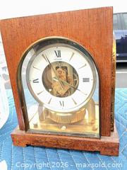 MaxSold Auction: Lot of 2: Mantel/Shelf Skeleton Clock and Slovakian Crystal Ice Bucket - Commerce (California, USA) PARTNER MANAGED Estate Sale Online Auction - Randolph Street (STORAGE)