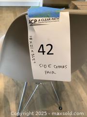 MaxSold Auction: Eames Molded Shell Side Chairs with Eiffel-Style Metal Bases - Set of 2 - Los Angeles (California, USA) PARTNER MANAGED Moving Online Auction - Kirkwood Drive