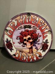 MaxSold Auction: Grateful Dead Wall Plaque &#38; Round Ceramic Skull &#38; Roses - Los Angeles (California, USA) PARTNER MANAGED Moving Online Auction - Kirkwood Drive