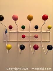 MaxSold Auction: Mid Century Wall-Mounted Coat Rack with Multicolor Ball Knobs - Los Angeles (California, USA) PARTNER MANAGED Moving Online Auction - Kirkwood Drive