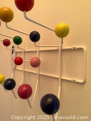 MaxSold Auction: Mid Century Wall-Mounted Coat Rack with Multicolor Ball Knobs - Los Angeles (California, USA) PARTNER MANAGED Moving Online Auction - Kirkwood Drive