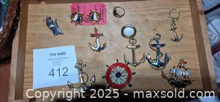 MaxSold Auction: Nautical jewelry in an inlaid wood box - Sun Valley (California, USA) SELLER MANAGED Estate Sale Online Auction -  Wentworth Street