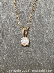 MaxSold Auction: 14K Gold Chain with Cubic Zirconia Stone - Toronto (Ontario, Canada) SELLER MANAGED Downsizing Online Auction - Lamb Avenue