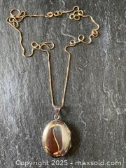 MaxSold Auction: BIRKS 10K Gold and Sterling Silver Locket on Gold Box Chain - Toronto (Ontario, Canada) SELLER MANAGED Downsizing Online Auction - Lamb Avenue