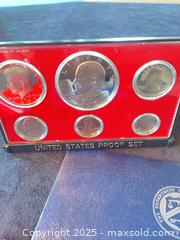 MaxSold Auction: Coin Collection - 1976–1977 Proof Sets with Eisenhower Dollar &#38; Gold Commemorative - Reston (Virginia, USA) SELLER MANAGED Moving Online Auction - Seaford Court