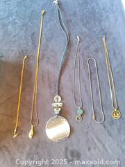MaxSold Auction: Necklace Lot of 6 — Gold &#38; Silver Plated, Leather/Fabric Cord - Reston (Virginia, USA) SELLER MANAGED Moving Online Auction - Seaford Court
