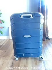 MaxSold Auction: Set of 2 Samsonite &#38; Tumi Large Travel Bags - Navy &#38; Teal - Reston (Virginia, USA) SELLER MANAGED Moving Online Auction - Seaford Court
