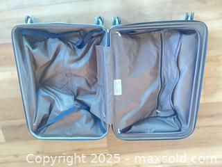 MaxSold Auction: Set of 2 Samsonite &#38; Tumi Large Travel Bags - Navy &#38; Teal - Reston (Virginia, USA) SELLER MANAGED Moving Online Auction - Seaford Court