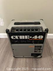 MaxSold Auction: Guitar Amp Roland Cube 40 Keyboard Vintage - Surrey (British Columbia, Canada) SELLER MANAGED Downsizing Online Auction - 85b Avenue