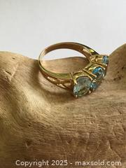 MaxSold Auction: 10 Karat Gold Blue Tri-Stone Ring - Saanich (British Columbia, Canada) SELLER MANAGED Reseller Online Auction - Old West Saanich Road