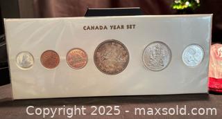MaxSold Auction: 1963 Canada Queen Elizabeth II coin set in  holder . SILVER DOLLAR , SILVER HALF , SILVER  - Aurora (Ontario, Canada) SELLER MANAGED Estate Sale Online Auction -  Closs Square