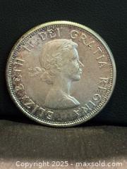 MaxSold Auction: SILVER COIN CANADA 1961 50 CENTS HALF DOLLAR  QEII CANADIAN .800 , Outstanding Condition - Aurora (Ontario, Canada) SELLER MANAGED Estate Sale Online Auction -  Closs Square