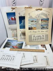 MaxSold Auction: McMurray Air Service Ltd. 1960s Promotional Calendar Boards (About 9 x 12") - Gull Lake (Alberta, Canada) SELLER MANAGED Reseller Online Auction -  Stuart Avenue
