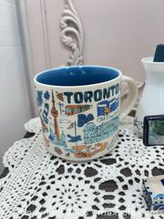 MaxSold Auction: Vintage Toronto Souvenir Set: Starbucks Mug, Silver Birch Creamer, Shakers, Figurine - Gull Lake (Alberta, Canada) SELLER MANAGED Reseller Online Auction -  Stuart Avenue