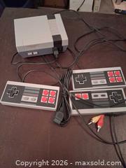 MaxSold Auction: Unbranded Entertainment System Retro NES-Style Console - Markham (Ontario, Canada) SELLER MANAGED Downsizing Online Auction - Adam Sellers Street (CONDO)