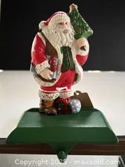 MaxSold Auction: Cast iron Santa stocking hanger - London (Ontario, Canada) SELLER MANAGED Downsizing Online Auction - Charlotte Street