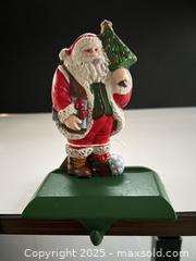 MaxSold Auction: Cast iron Santa stocking hanger - London (Ontario, Canada) SELLER MANAGED Downsizing Online Auction - Charlotte Street
