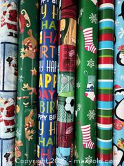 MaxSold Auction: Christmas wrapping paper -9 partial rolls - London (Ontario, Canada) SELLER MANAGED Downsizing Online Auction - Charlotte Street