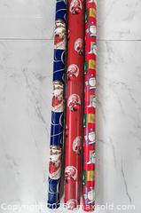 MaxSold Auction: Christmas Wrapping paper - 3 new rolls  - London (Ontario, Canada) SELLER MANAGED Downsizing Online Auction - Charlotte Street