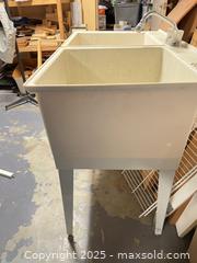 MaxSold Auction: Double-basin laundry tub with faucet - London (Ontario, Canada) SELLER MANAGED Downsizing Online Auction - Charlotte Street
