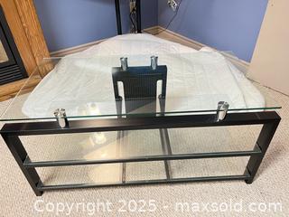 MaxSold Auction: Floating glass and metal TV shelf - London (Ontario, Canada) SELLER MANAGED Downsizing Online Auction - Charlotte Street