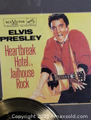 MaxSold Auction: 1989 Elvis Presley 24KT Gold Plated 45 Record Heartbreak Hotel/Jailhouse Rock Framed  - Langley (British Columbia, Canada) SELLER MANAGED Reseller Online Auction - 68 Avenue