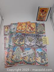 MaxSold Auction: 1999 Pokemon TV Topps incl 8 Foils &#38; Diecut Charmeleon (28 total cards)  - Langley (British Columbia, Canada) SELLER MANAGED Reseller Online Auction - 68 Avenue