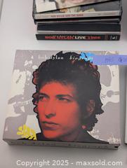 MaxSold Auction: Bob Dylan CD Collection (12 Bob Dylan CDs &#38; 2 Jakob Dylan CDs) - Langley (British Columbia, Canada) SELLER MANAGED Reseller Online Auction - 68 Avenue