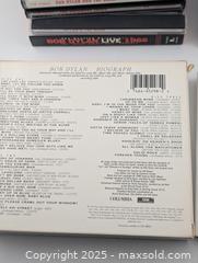 MaxSold Auction: Bob Dylan CD Collection (12 Bob Dylan CDs &#38; 2 Jakob Dylan CDs) - Langley (British Columbia, Canada) SELLER MANAGED Reseller Online Auction - 68 Avenue