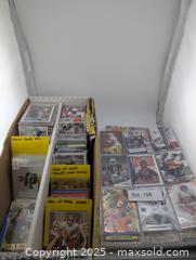 MaxSold Auction: Huge NFL Football Card Collection incl Stars, Rookie &#38; Numbered Cards (over 1000 cards) - Langley (British Columbia, Canada) SELLER MANAGED Reseller Online Auction - 68 Avenue