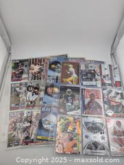 MaxSold Auction: Huge NFL Football Card Collection incl Stars, Rookie &#38; Numbered Cards (over 1000 cards) - Langley (British Columbia, Canada) SELLER MANAGED Reseller Online Auction - 68 Avenue