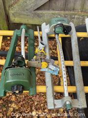 MaxSold Auction: Garden Wheelbarrow, Hose Reel Cart, and Orbit Sprinklers - Victoria (British Columbia, Canada) SELLER MANAGED Moving Online Auction - Toronto Street