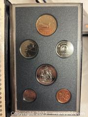 MaxSold Auction: Set of 3 Royal Canadian Mint Coin Sets  - Victoria (British Columbia, Canada) SELLER MANAGED Moving Online Auction - Toronto Street