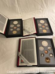 MaxSold Auction: Set of 3 Royal Canadian Mint Proof Sets  - Victoria (British Columbia, Canada) SELLER MANAGED Moving Online Auction - Toronto Street